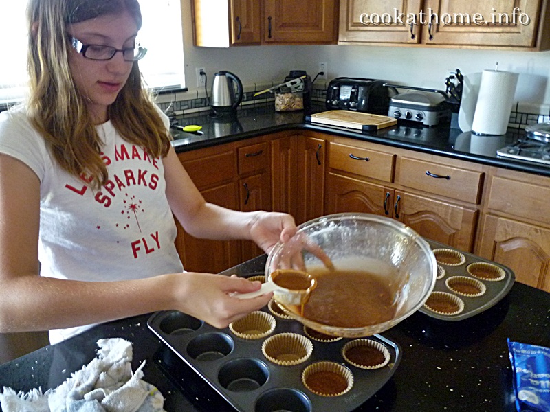 2015-08-08 Abby pouring lava cupcakes