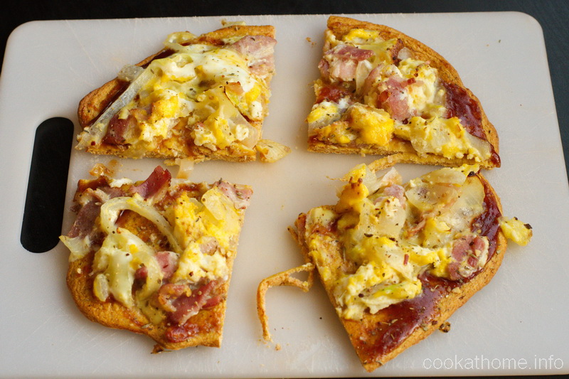 Not sure why it's called an Aussie egg and bacon pizza, but this re-creation of a family favorite hits the spot! #pizza