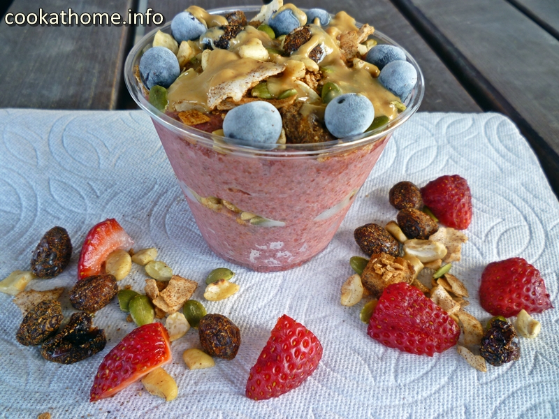 A refreshing breakfast, this strawberry chia pudding, topped with trail mix and nut butter, will keep you full for ages! #chiapudding